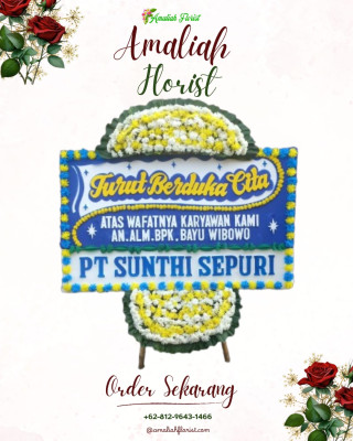 Papan Bunga Duka di Taman Indah